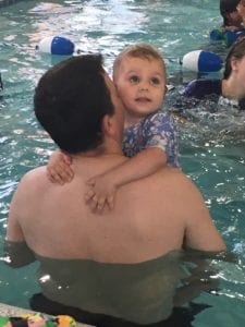 Grace and Dad swimming